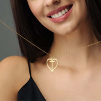 Thumbnail for Heart Initial Necklace worn by a woman, featuring a delicate gold design, from Brother & Sisters.