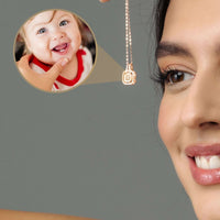 Thumbnail for Square Photo Necklace showcasing a smiling baby charm held by a woman, by Brother & Sisters.