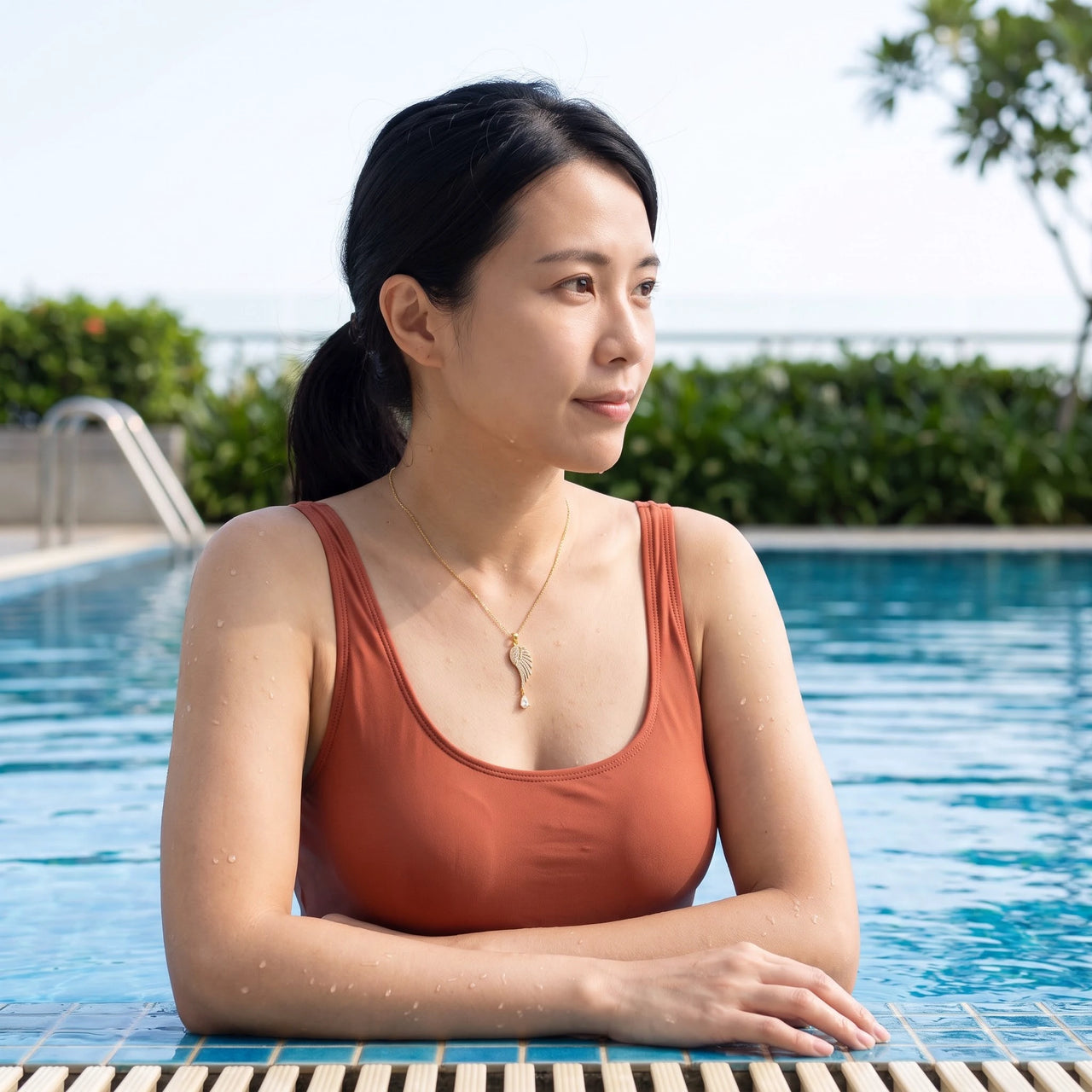 The gold necklace worn by the pool, waterproof stainless steel | SKU: 42005-gold