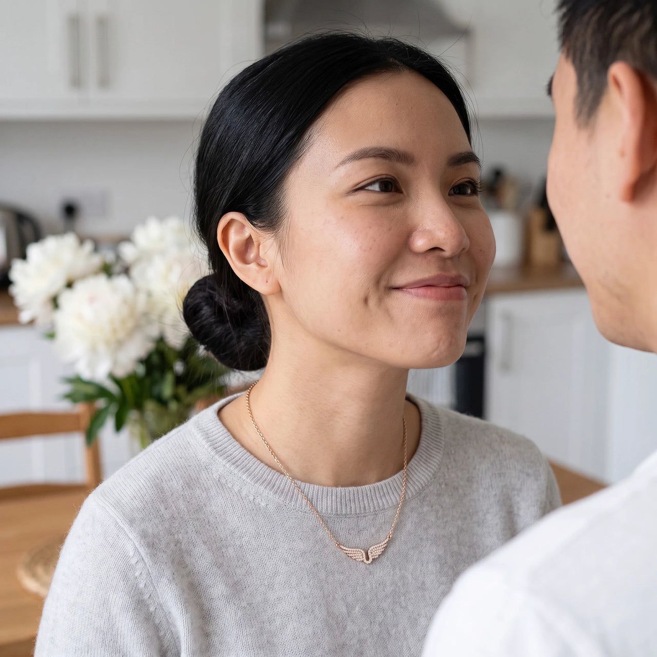 Profile view of a woman wearing the rose gold necklace | SKU: 42002-rose-gold