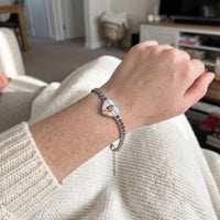 Thumbnail for The silver heart photo bracelet on the wrist, showing the lobster clasp and extension chain | SKU: TPH-HRTB-SILVER