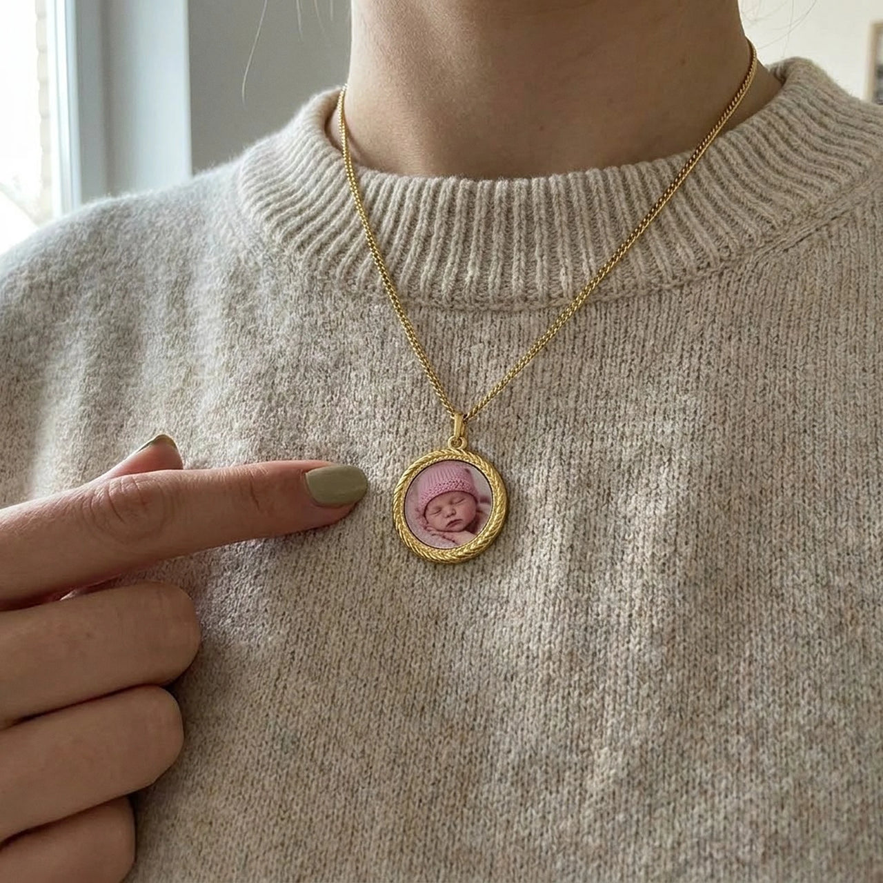 Looking down at the gold round pendant worn on her chest, real small size | SKU: TPH-RNDN-GOLD